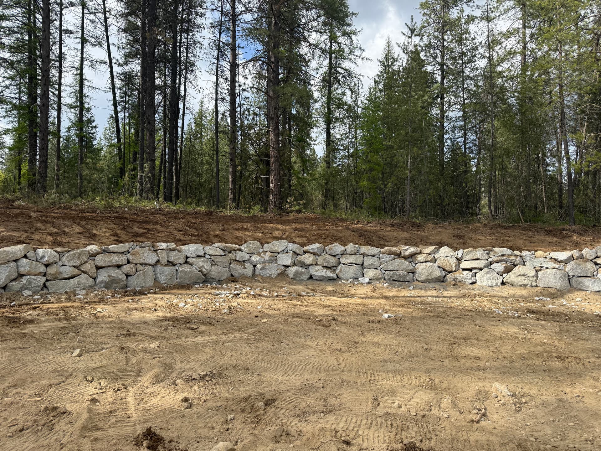 Granite Retaining Wall Taking Shape in Deer Park image