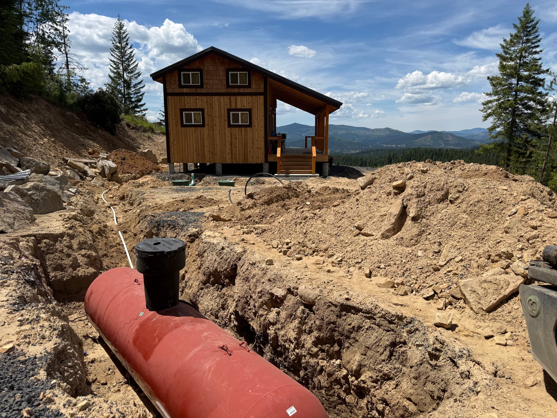 Off-Grid Cabin Gets Full Underground Utility Setup in North Idaho image