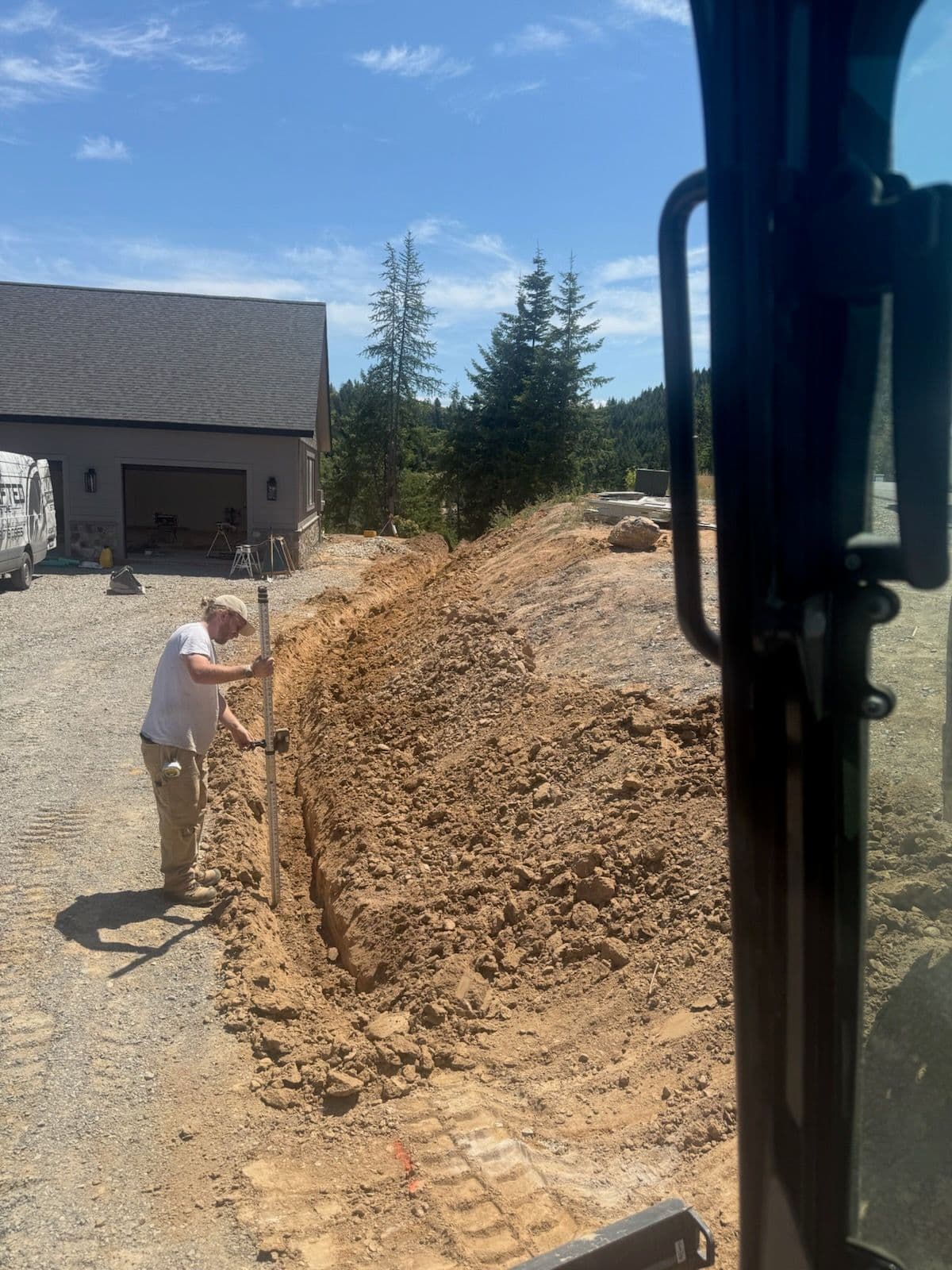 Expert Drainage Solutions for Hillside Rock Wall image